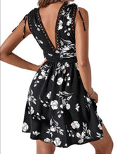 Load image into Gallery viewer, Black floral a-line dress with adjustable tie up straps
