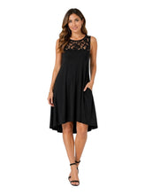 Load image into Gallery viewer, Black dress with pockets.
