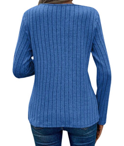 Blue ribbed knit sweater with asymmetrical cut out neck