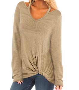 Long sleeve cut out design twisted hem top