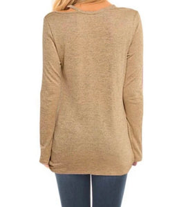 Long sleeve cut out design twisted hem top