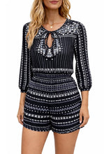 Load image into Gallery viewer, Black patterned tie up romper

