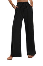 Load image into Gallery viewer, Black wide leg pants with pockets
