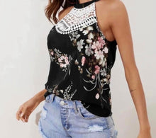 Load image into Gallery viewer, Navy floral halter style top with crochet detail
