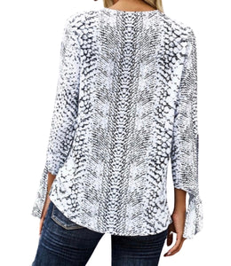 Animal print blouse with knotted detail at the sleeve