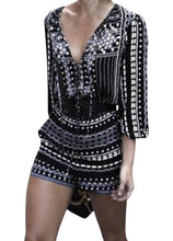 Load image into Gallery viewer, Black patterned tie up romper
