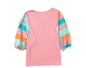 Pink v neck top with multi coloured striped dolman sleeves