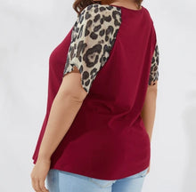 Load image into Gallery viewer, Red v-neck tee with leopard print sleeves
