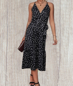 Black polka dot belted dress with criss cross back