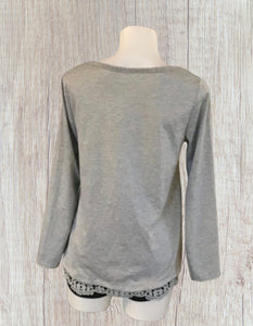 High/low loose fitting top with crochet trim