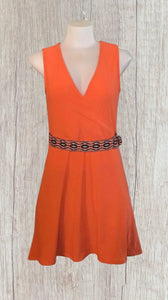 Orange crossover dress with decorative belt