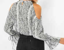 Load image into Gallery viewer, Animal print cold shoulder blouse with tie up cuffs
