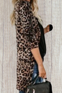 Lightweight leopard print cardigan with buttons and pockets.