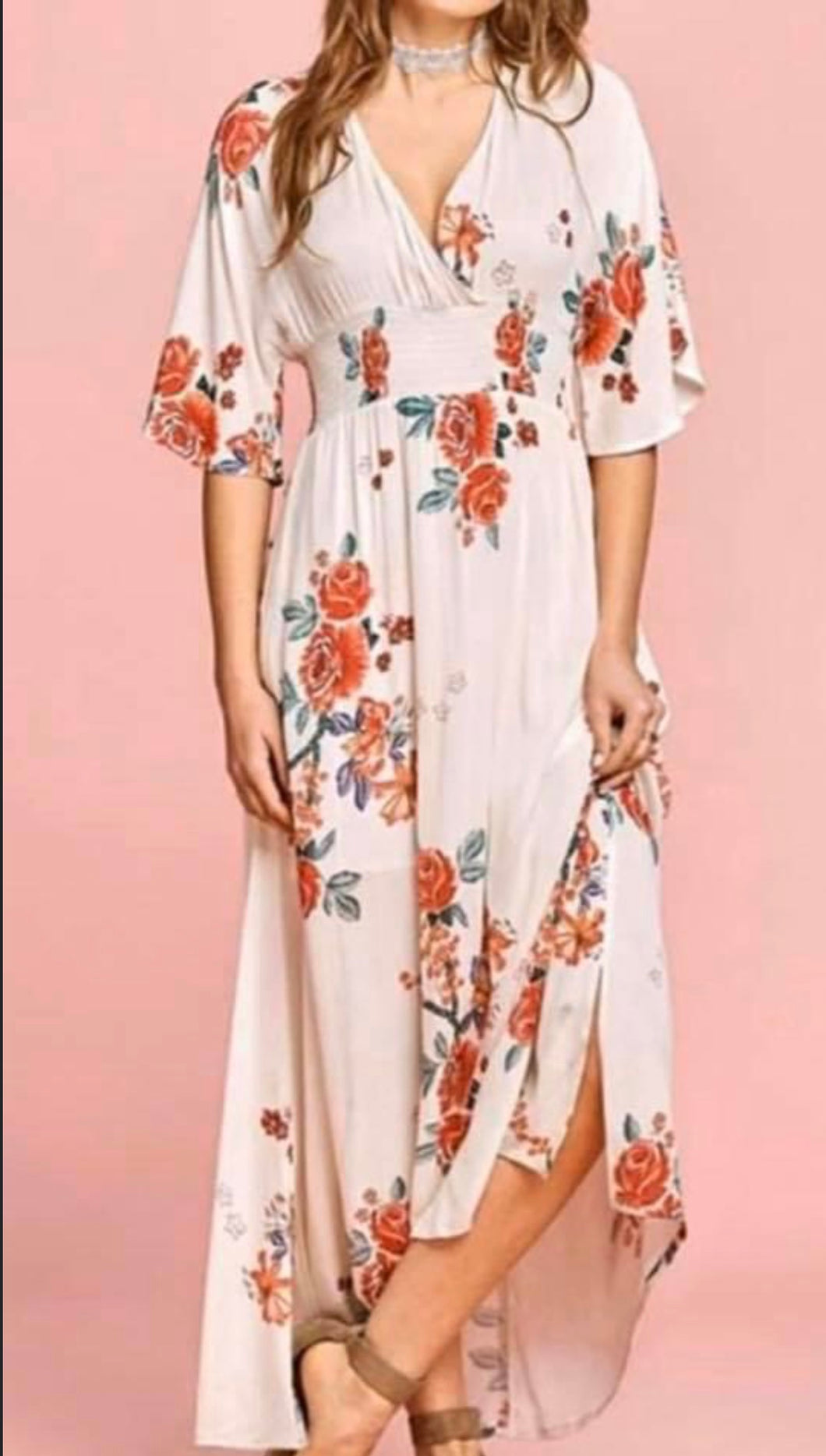 White floral maxi dress with deep v in front and back