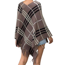 Load image into Gallery viewer, Brown striped poncho with tassels.
