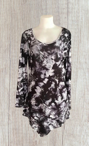 Patterned long sleeve dress with asymmetrical hem