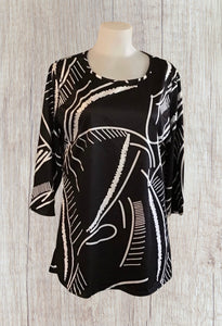 Black tunic top with white design.