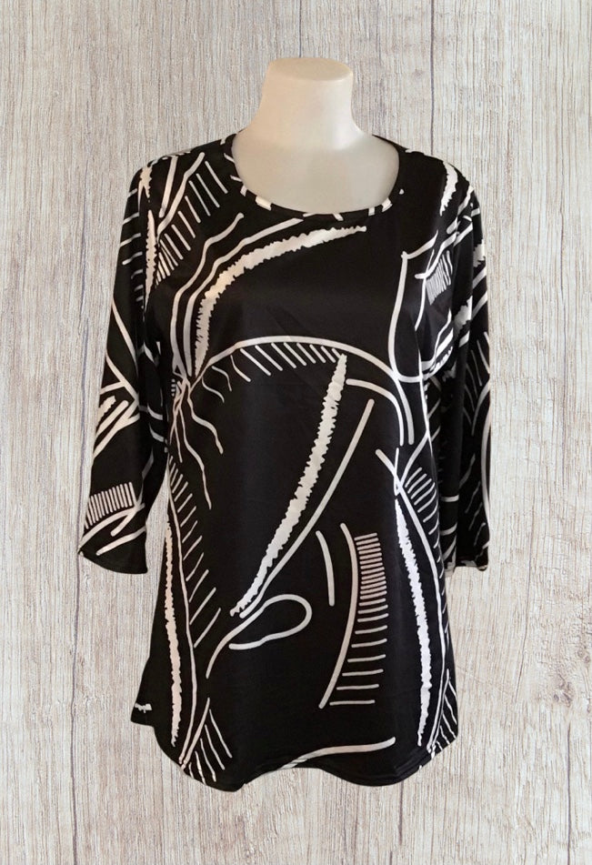 Black tunic top with white design.