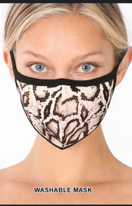 Snakeskin print face mask.