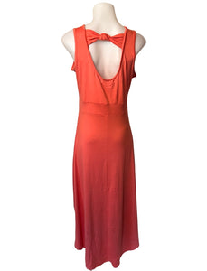 High/low coral dress with cut out knotted back