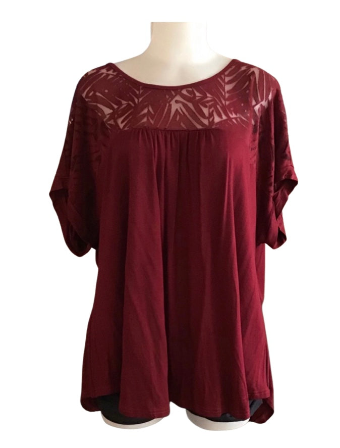 Plus size top with lace.