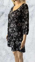 Load image into Gallery viewer, Black floral lined dress with criss cross back
