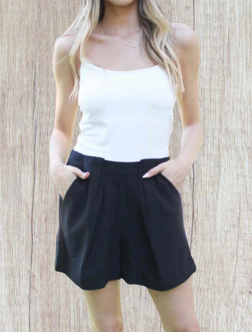 Black pleated shorts with front pockets