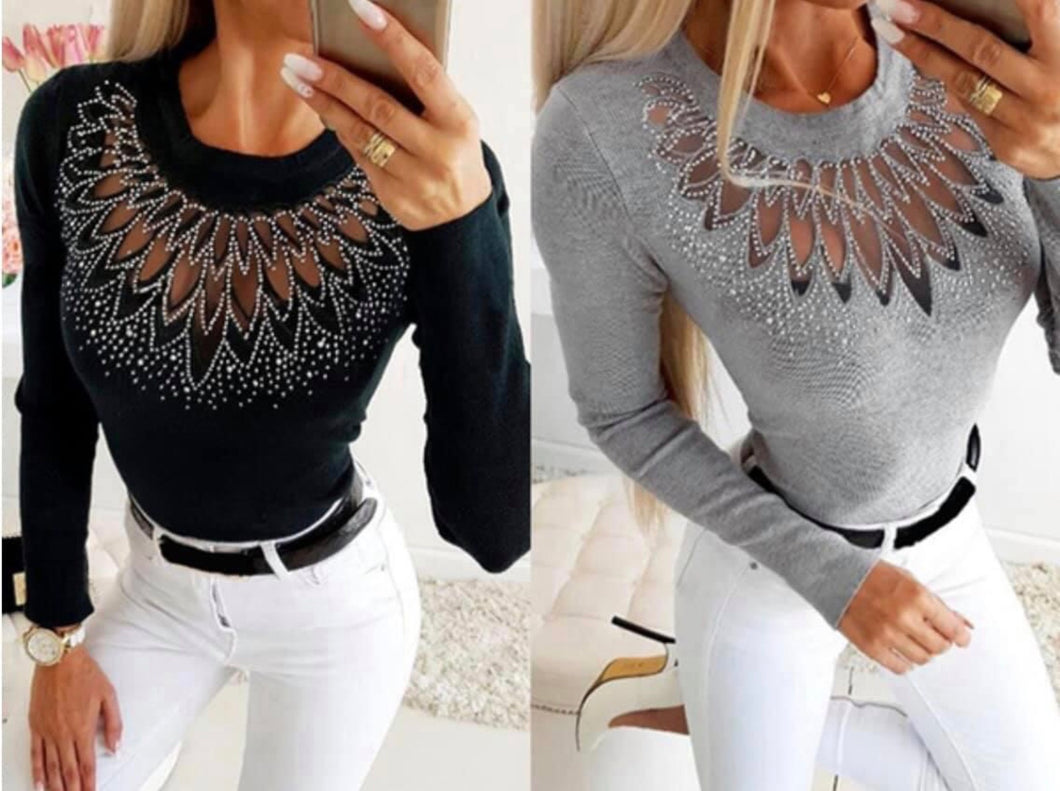 Long sleeve shorter style sweater with mesh front & lots of bling (sequins)