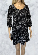 Load image into Gallery viewer, Black floral lined dress with criss cross back
