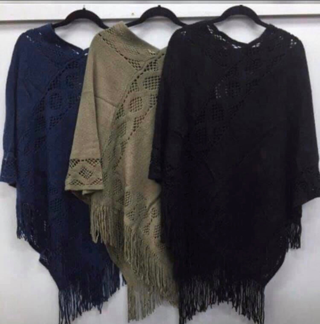 Acrylic knit ponchos with tassels