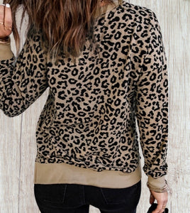 Leopard print pullover sweater with side slits