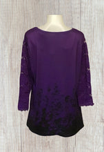 Load image into Gallery viewer, Plus size Purple top with black floral pattern and crochet sleeve
