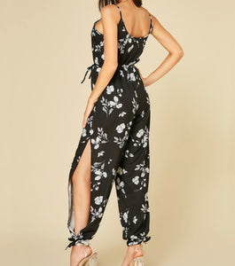 Black print jumpsuit with  open legs and pockets