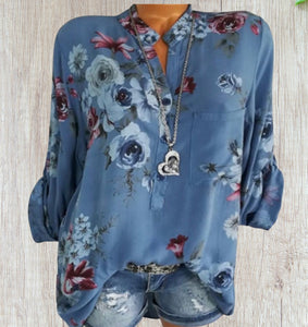 Button up floral blouse with 3/4 sleeve option.