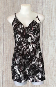 Black print romper with black zipper