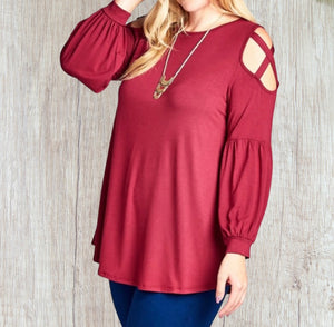 Plus size top with criss cross shoulder