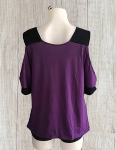 Cold shoulder short sleeve top.