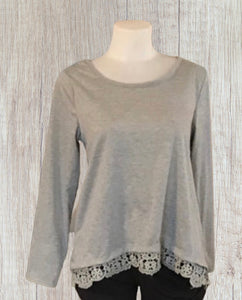 High/low loose fitting top with crochet trim
