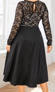 Plus size black dress with long sleeves