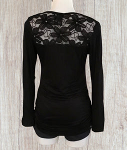 Black long sleeve top with upper floral lace and bell sleeves