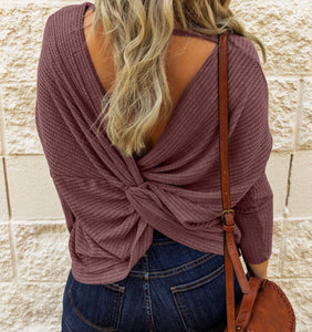 Waffle knit long sleeve top with twisted knot in back