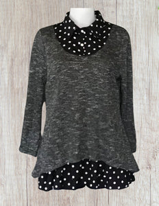 Cute tunic top with polka dot trim.