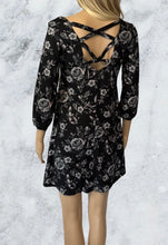 Load image into Gallery viewer, Black floral lined dress with criss cross back
