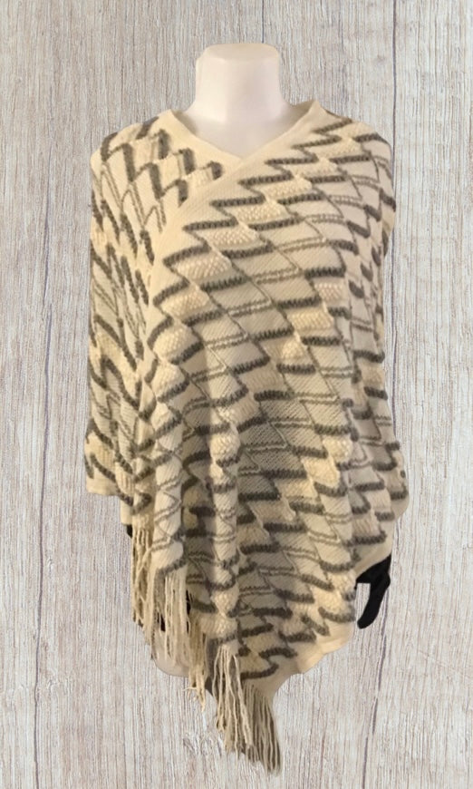 Beige striped acrylic poncho with tassels