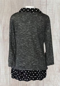 Cute tunic top with polka dot trim.