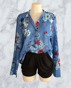 Button up floral blouse with 3/4 sleeve option.