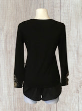 Load image into Gallery viewer, Long sleeve black top with mesh and gold bling on front and cuffs
