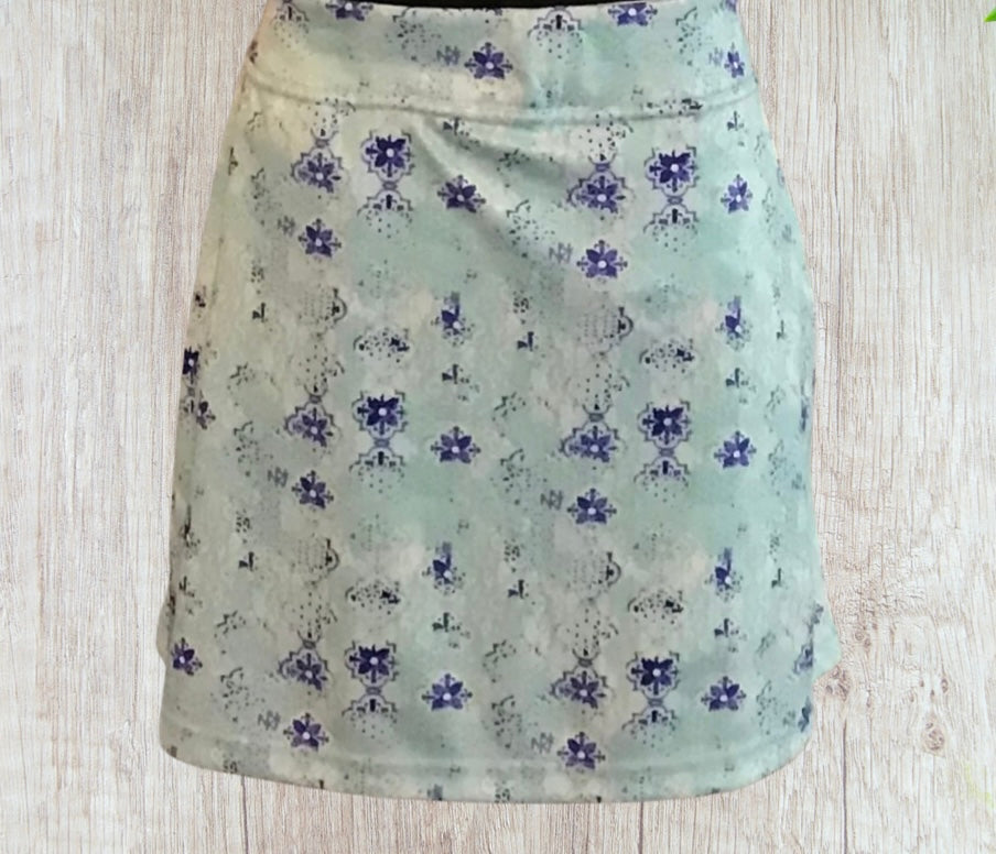 Blue patterned skorts with pockets.