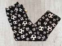 Load image into Gallery viewer, Ladies soccer print capris.
