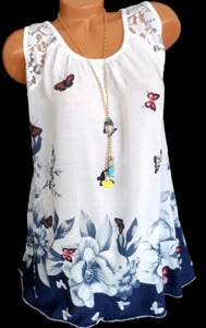 Sleeveless top with butterfly/floral pattern and upper lace